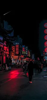 Neon-lit urban street at night with vibrant colors.