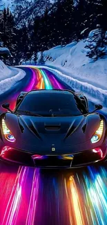 Sleek car on a vibrant, colorful road at night in a snowy landscape.