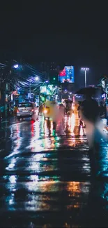 City street at night with vibrant reflections on wet pavement.