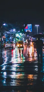 Vibrant and colorful night street scene with reflections on wet pavement.