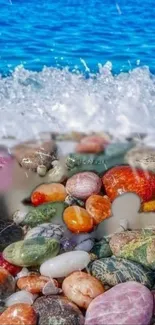 Colorful ocean pebbles with waves crashing over.