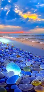 Vibrant beach with glowing pebbles at sunset along the ocean shore.