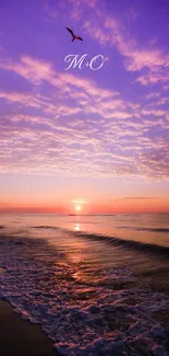 Vibrant ocean sunset with purple sky and gentle waves crashing on the beach.