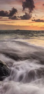 Vibrant sunset over ocean waves with colorful sky.