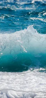 Turquoise ocean waves crashing onto a sandy beach, creating a vibrant seascape.