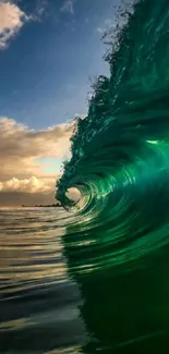 Vibrant turquoise ocean wave captured at sunset.