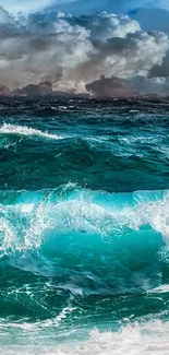 Vibrant turquoise ocean waves crashing under dramatic clouds.