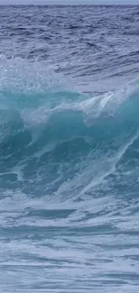 Vivid blue ocean wave crashing in a serene seascape.