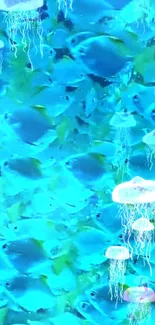 Vibrant wallpaper with blue fish and glowing jellyfish in an aquatic scene.