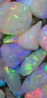 Vibrant opal gemstones with iridescent colors on a mobile wallpaper.