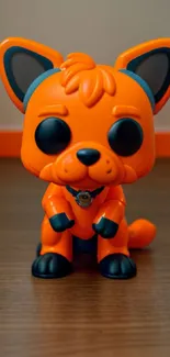 Vibrant orange dog figurine with bold colors and cute design.