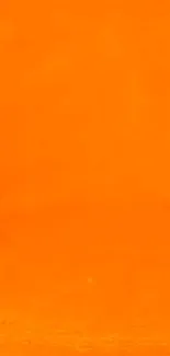 Vibrant orange gradient wallpaper with a touch of fiery brightness.