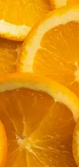 Vibrant orange slices layered closely, creating a citrus-themed wallpaper.