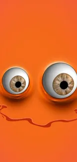 Vibrant orange wallpaper with smiley face and expressive eyes.