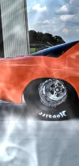 Vibrant orange sports car parked outdoors.