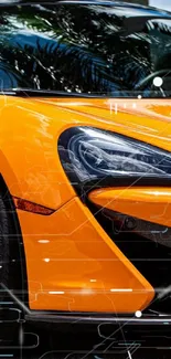 Orange sports car with sleek design in parking lot.