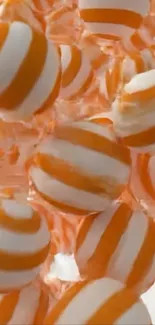 Orange and white striped spheres wallpaper