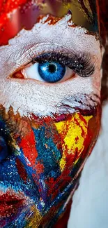 A striking image of a blue eye with colorful face paint for a mobile wallpaper.