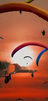 Colorful paragliders flying against a stunning sunset sky.