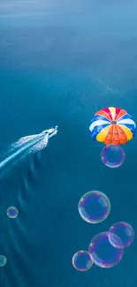 Colorful parasailing over blue ocean waters.