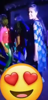 People dancing at a vibrant party with colorful lights and a heart-eye emoji overlay.