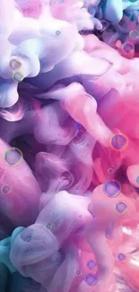 Vibrant pastel smoke wallpaper with pink and purple swirls.