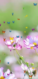 Pastel flowers in pink and purple against a blurred green background.