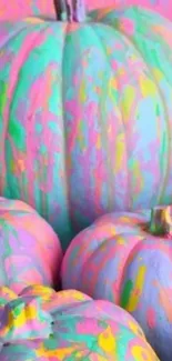 Vibrantly painted pastel pumpkins in a colorful abstract style.