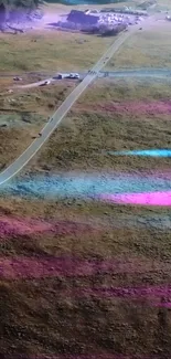 Aerial view of a colorful road with vibrant pastel hues.