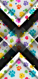 Colorful paw prints on a black background wallpaper.