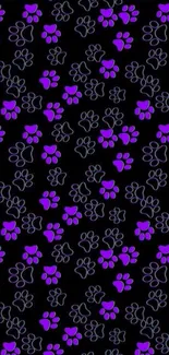 Wallpaper with purple paw prints on black background.