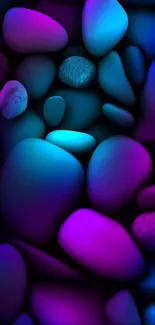 Vibrant pebbles in blue and purple hues for a modern phone wallpaper.