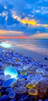 Colorful pebbles on a beach at sunset.