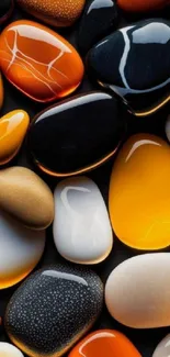 Colorful pebbles with orange, black, and white stones.