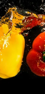 Vibrant yellow and red peppers splashing in water.