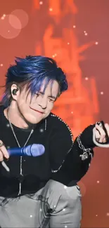 Performer with blue hair on stage in a vibrant setting.