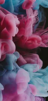 Colorful pink and blue smoke abstract wallpaper.