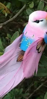 Colorful pink bird with vivid feathers on a leafy background.