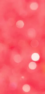 Vibrant pink bokeh wallpaper with soft glowing circles for phone screen.