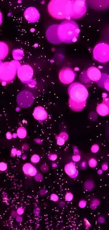 Bright pink bokeh lights against dark background for mobile wallpaper.