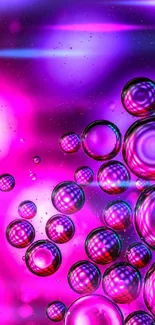 Vibrant abstract bubbles in pink and purple hues create a dynamic mobile wallpaper.