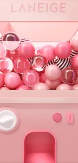 Pink vending machine filled with glossy balls.