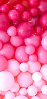 Vibrant pink bubbles forming an abstract, playful mobile wallpaper.