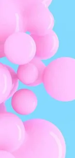 Pink bubbles on a light blue background, creating a vibrant wallpaper.