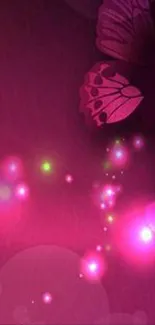 Vibrant pink butterfly wallpaper with glowing orbs and mystical theme.