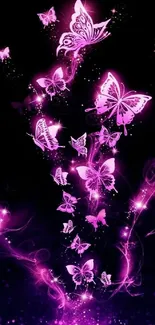 Glowing pink butterflies on dark mobile wallpaper.