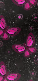 Vibrant pink butterfly wallpaper on starry black background.