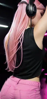 DJ with pink hair and headphones in a neon-lit club.