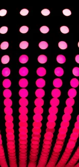 Vibrant pink dotted pattern mobile wallpaper.