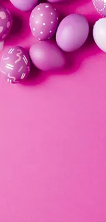 Pink Easter eggs mobile wallpaper with a festive design.